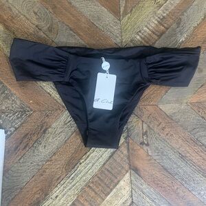 A.Che black hipster bikini bottoms size M . NWT